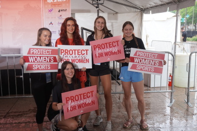 Female athletes and supporters attend the 'Our Bodies, Our Sports' rally at Freedom Plaza in Washington, DC on June 23, 2022.