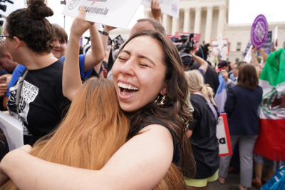 Pro-life supporters hug outside the U.S. Supreme Court in Washington, D.C., on June 24, 2022. - The U.S. Supreme Court on Friday overturned the landmark 1973 Roe v. Wade decision.