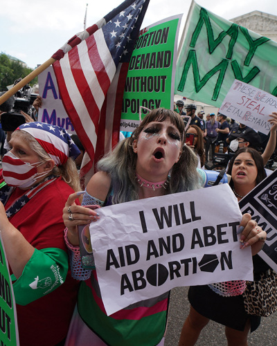Pro-choice and anti-abortion demonstrators gather outside the U.S. Supreme Court in Washington, D.C., on June 24, 2022.