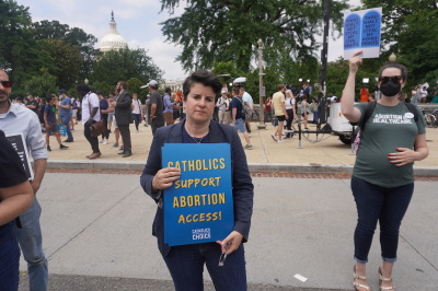 Jamie Manson of Catholics for Choice attends a rally at the U.S. Supreme Court following the Dobbs v. Jackson Women's Health Organization decision on June 24, 2022. 