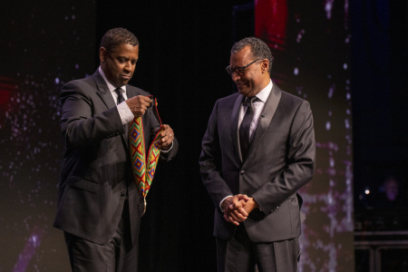 Actor Denzel Washington honors Pastor A.R. Bernard at the "Blessing of the Elders" ceremony hosted by the Museum of the Bible in Washington, D.C., on June 23, 2022.