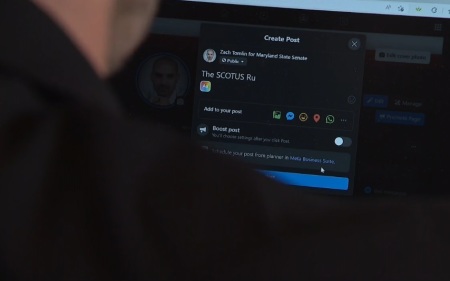 Republican Maryland Senate candidate Zach Tomlin types in a post on social media during video clip aired by WBFF in July 2022.