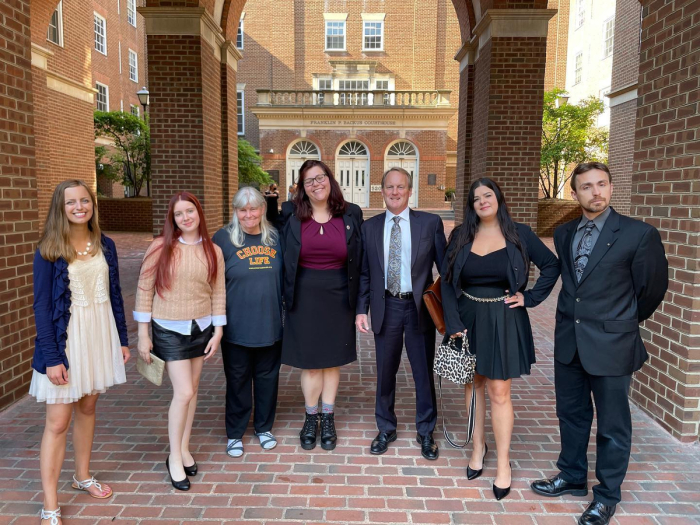 Pro-life activists Cassidy Shooltz, Kristin Turner, Joan Andrews Bell, Lauren Handy, Terrisa Bukovinac and Jonathan Darnel are pictured with their lawyer outside the Alexandria Circuit Court in Alexandria, Virginia, ahead of their sentencing for 'trespassing' at an abortion facility on July 12, 2022.