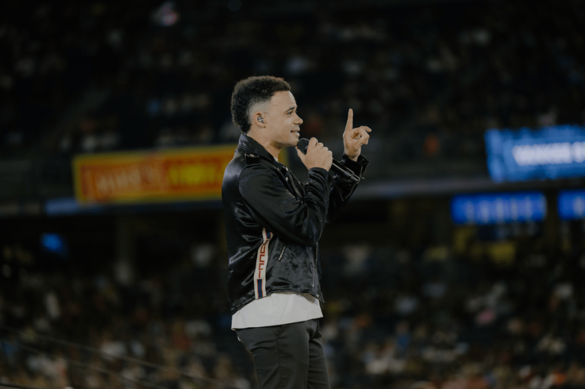 Tauren Wells performs at the "Come Home to Hope" event on Aug. 6, 2022 at Yankee Stadium in New York City. 