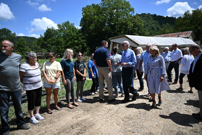 President Joe Biden and first lady Jill Biden speak to families impacted by flood waters in Lost Creek, Kentucky, on August 8, 2022. 