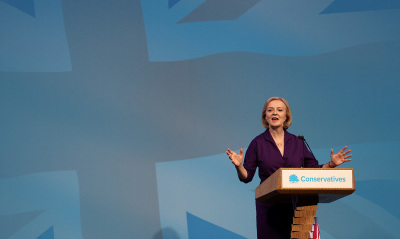 New Conservative Party leader and Britain's Prime Minister-elect Liz Truss delivers a speech at an event to announce the winner of the Conservative Party leadership contest in central London on September 5, 2022. - Truss is the U.K.'s third female prime minister following Theresa May and Margaret Thatcher. The 47-year-old has consistently enjoyed overwhelming support over 42-year-old Sunak in polling of the estimated 200,000 Tory members who were eligible to vote. 
