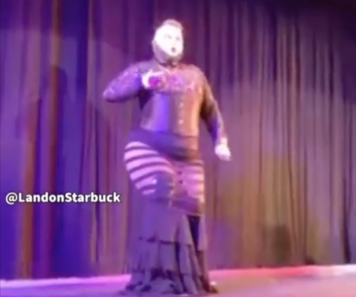 A drag performer dancing to the song “Take Me to Church” by Irish singer-songwriter Hozier.