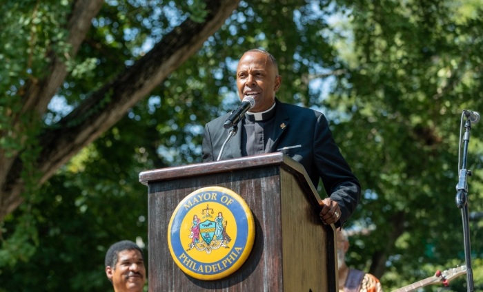 The Very Rev. Canon Martini Shaw, rector of the historic African Episcopal Church of St. Thomas in Philadelphia, Pennsylvania, gives remarks at a ceremony held Sept. 17, 2022, renaming a section of Lancaster Avenue in honor of the Rev. Absalom Jones.