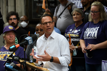 Pennsylvania Attorney General and Democratic nominee for governor Josh Shapiro speaks at a rally along with union members in front of the Smithfield United Church of Christ on Sept. 19, 2022, in Pittsburgh, Pennsylvania.