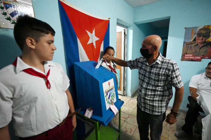 A man casts his vote at a polling station during the new Family Code referendum in Havana on September 25, 2022. 