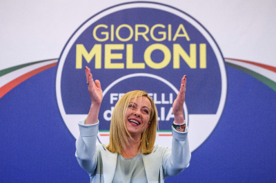 Giorgia Meloni, leader of the Fratelli d'Italia (Brothers of Italy) gestures during a press conference at the party electoral headquarters overnight, on Sept. 25, 2022 in Rome, Italy. The snap election was triggered by the resignation of Prime Minister Mario Draghi in July, following the collapse of his big-tent coalition of leftist, right-wing and centrist parties. 