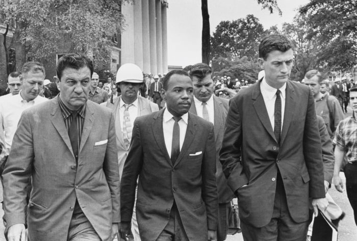 American activist James Meredith on his way to class at University of Mississippi, escorted by US Marshal James McShane, left, and John Doar of the Justice Department, Oxford, Mississippi, October 1962.