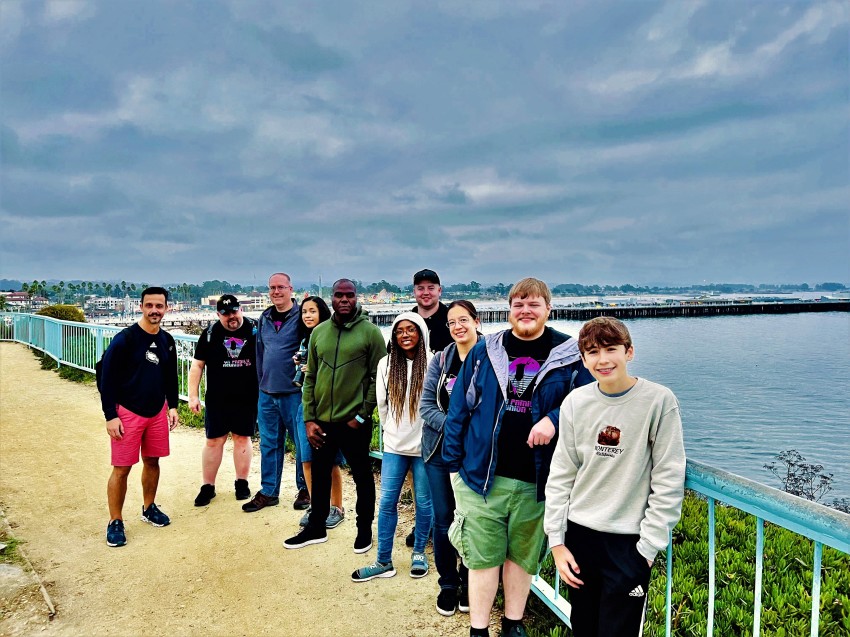 A few members of the Cornerstone Church Yuba City metaverse church group in Santa Cruz, Calif., on Oct. 15, 2022. From L-R are: Michael ‘Pastor Goose’ Uzdavines, missionary pastor to the metaverse; Paul James, a VR church member from Wales; Jason Gardner, from Sacramento, Calif.; “Tezzy" from New York; reporter for The Christian Post, Leonardo Blair (green jacket); Angel VanEllison, a software engineer from Georgia who directs the church’s Altspace VR campus; Caleb Webb, from Cedar Rapids, Iowa; Nicole White, the church’s director of operations; Stewart Freeman, from North Carolina who directs the VR Chat campus, and Ezra Poling, Pastor Jason Poling’s 15-year-old son who is also the church’s groundskeeper.