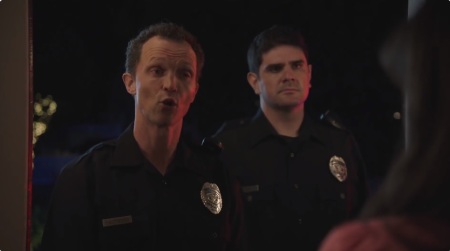 Police officers arrest a mother in a fictional campaign advertisement sponsored by Rep. Eric Swalwell, D-Calif., during the 2022 midterm election season.