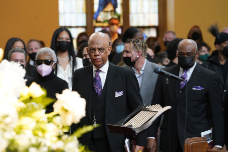 The Rev. Calvin O. Butts III and guests attend the André Leon Talley Celebration of Life at The Abyssinian Baptist Church on April 29, 2022, in New York City.