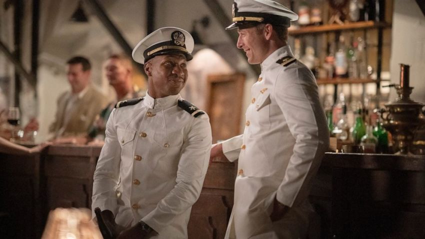 Jonathan Majors, left, and Glen Powell in a scene from "Devotion." 