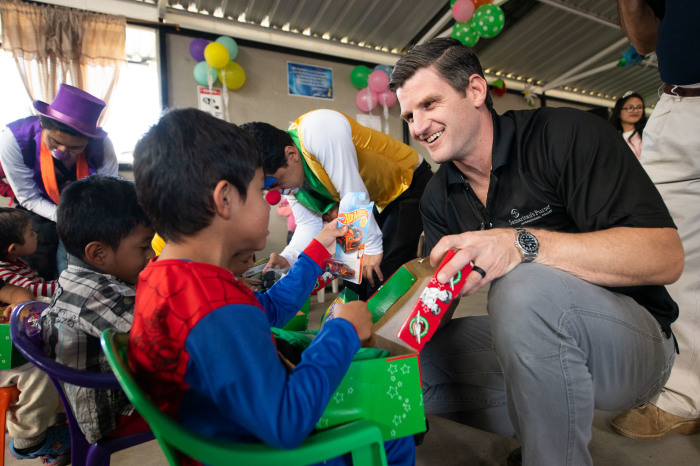 Edward Graham distributing shoeboxes through the Operation Christmas Child program in Ecuador in 2019.