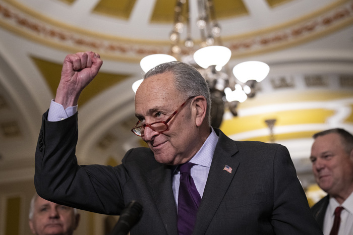 Senate Majority Leader Chuck Schumer, D-N.Y., speaks to reporters after meeting with Senate Democrats at the U.S. Capitol on Nov. 29, 2022, in Washington, D.C. The Senate passed the so-called Respect for Marriage Act, which enshrines same-sex marriage into federal law. 