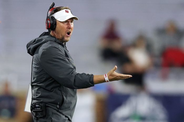 Head coach Hugh Freeze of the Liberty Flames reacts during the first half of the LendingTree Bowl against the Eastern Michigan Eagles at Hancock Whitney Stadium on December 18, 2021, in Mobile, Alabama.