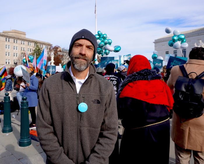Blaine Adamson, who operates a screen-printing business in Lexington, Kentucky, attends a rally outside the United States Supreme Court in support of 303 Creative owner Lorie Smith, Dec. 5, 2022.