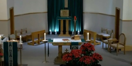 The sanctuary of St. Joseph Catholic Church, a Catholic parish in the Roman Catholic Diocese of Lansing located in St. Johns, Michigan.