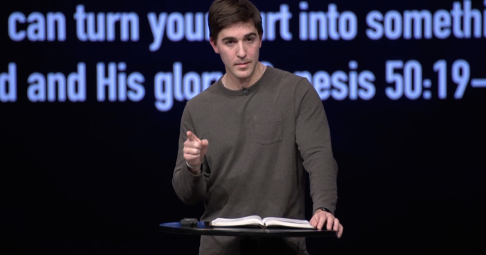Austin Hamrick, the young adult pastor of Cornerstone Chapel in Leesburg, Virginia, preaching a sermon about anger on Dec. 2, 2022.