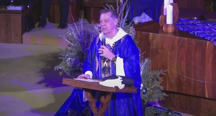Father Michael Pfleger, the senior pastor of The Faith Community of Saint Sabina of Chicago, Illinois, addresses his congregation on Sunday, Dec. 11, 2022. 