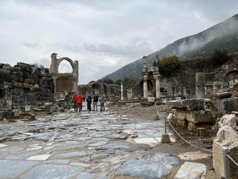 Visitors travel down a road in the ancient city of Ephesus Located near Selcuk in Izmir, Turkey.