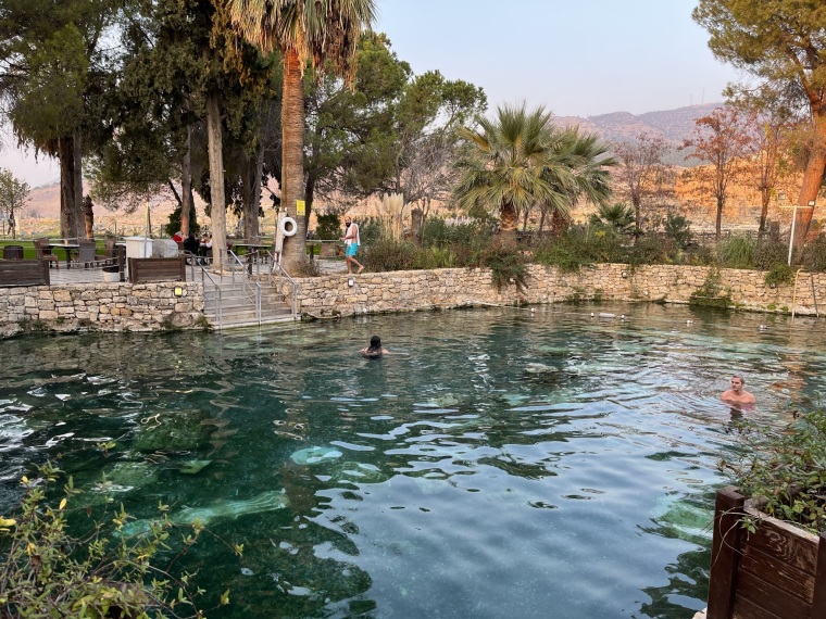 Tourists swim in a pool of calcite-rich water at the the Hierapolis-Pamukkale in Denizli, Turkey. 