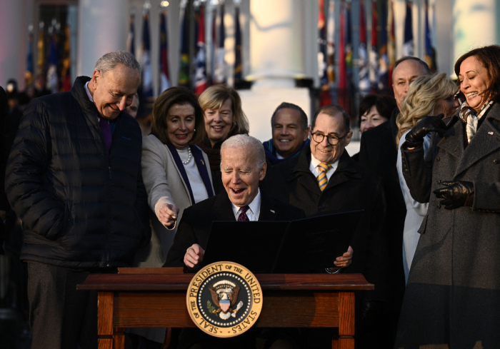 President Joe Biden signs the Respect for Marriage Act on the South Lawn of the White House in Washington, D.C., on Dec. 13, 2022. The U.S. Congress, on Dec. 8, 2022, passed the landmark legislation to protect same-sex marriage under federal law. 