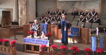 Attendees participate in a worship service at First United Methodist Church of Jonesboro, Arkansas on Sunday, Dec. 18, 2022.