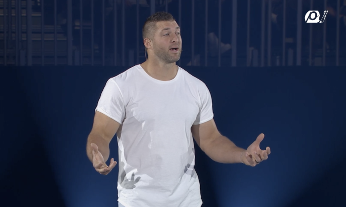 Tim Tebow speaks at the Passion Conference in Atlanta, Georgia, on Jan. 5, 2023.
