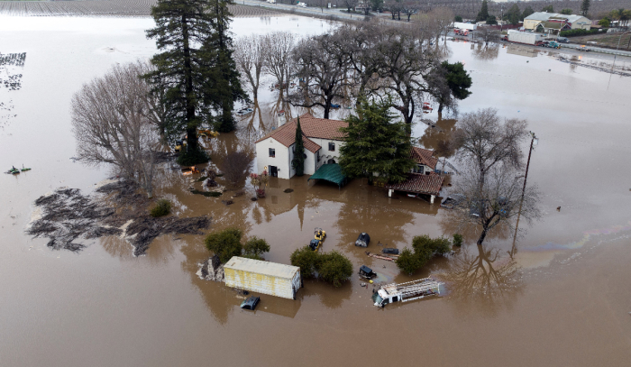 This aerial view shows a flooded home partially underwater in Gilroy, California, on Jan. 9, 2023. 