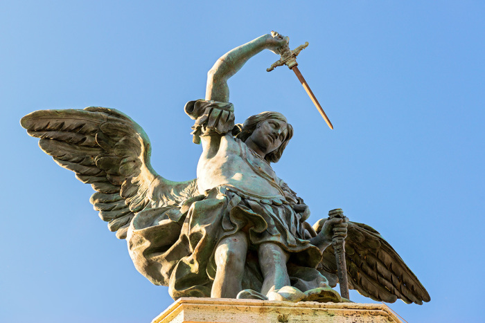 Saint Michael statue at top of Castel Sant`Angelo in Rome, Italy