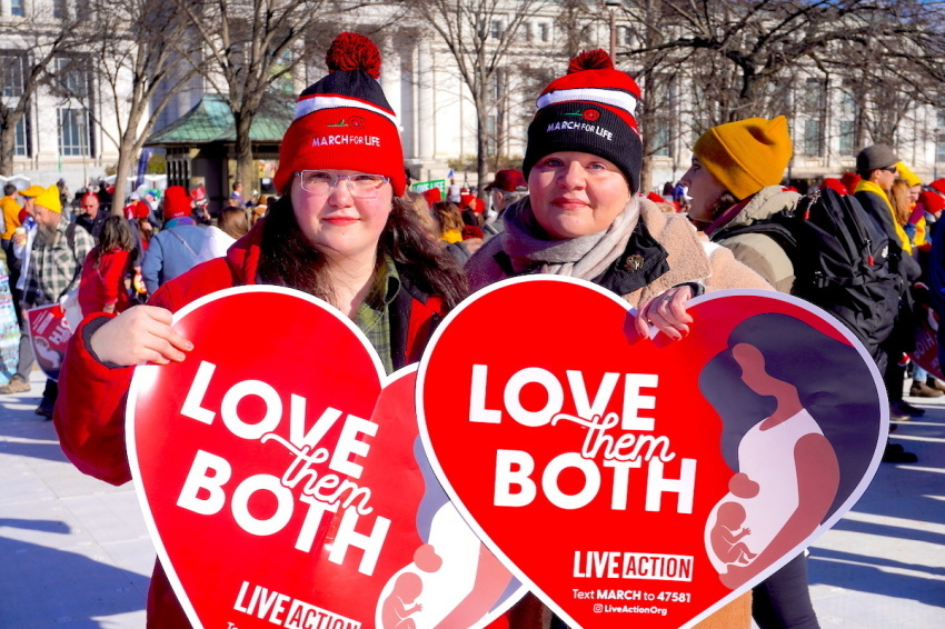 Mary Elizabeth Cole (L) and Courtney Dellinger (R), from Canajoharie, New York, join thousands of others at the March for Life in Washington, D.C., on Jan. 20, 2023.