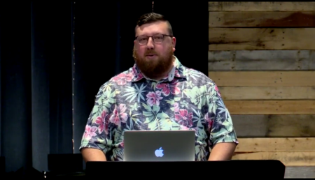 Pastor Michael Galtin's son, Jackson Gatlin, speaks at Vineyard Church in Duluth, Minnesota, on July 3, 2022. 