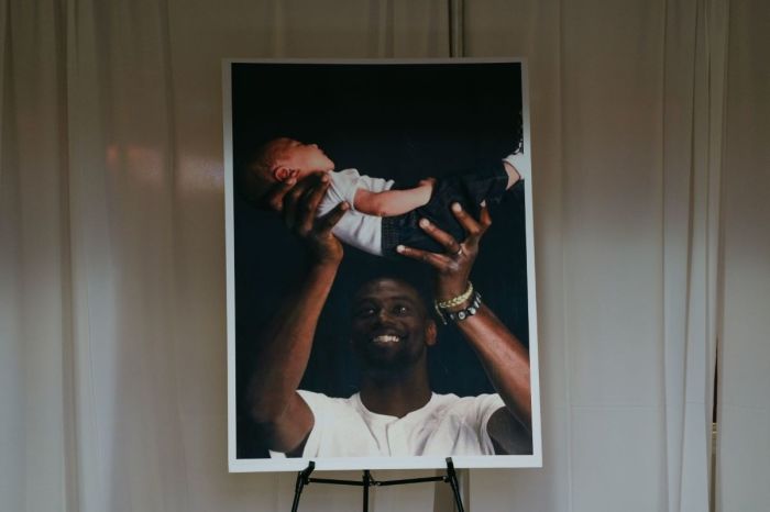 A photograph of Tyre Nichols holding his child sits in the foyer of Mississippi Boulevard Christian Church on Feb. 1, 2023, in Memphis, Tennessee. On Jan. 7, 29-year-old Nichols was violently beaten for three minutes by Memphis police officers at a traffic stop and died of his injuries. Five Black Memphis Police officers have been fired after an internal investigation found them to be directly responsible for the beating and have been charged with second-degree murder, aggravated assault, two charges of aggravated kidnapping, two charges of official misconduct and one charge of official oppression. 
