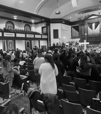 Students gather at Hughes Auditorium at Asbury University during a revival event that began on Wednesday, Feb. 8, 2023. 