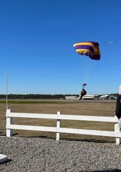 Roy Jernigan, 98, completes his skydive in North Carolina on January 24, 2023.