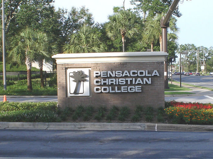 A sign sits at the entrance to Pensacola Christian College in Florida