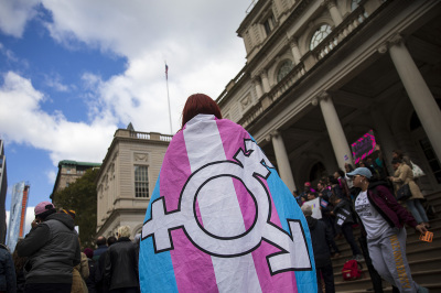 Trans activists and their supporters rally in support of transgenderism on the steps of New York City Hall, October 24, 2018, in New York City. 