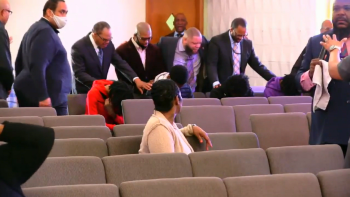 Congregants of All Creation Northview Holiness Family Church in Ferguson, Missouri, pray for a group of armed young men who entered the church on February 12, 2023.