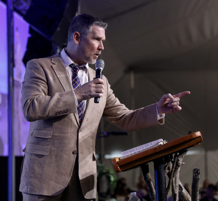 Pastor Greg Locke preaching at Global Vision Bible Church in Tennessee, 2023