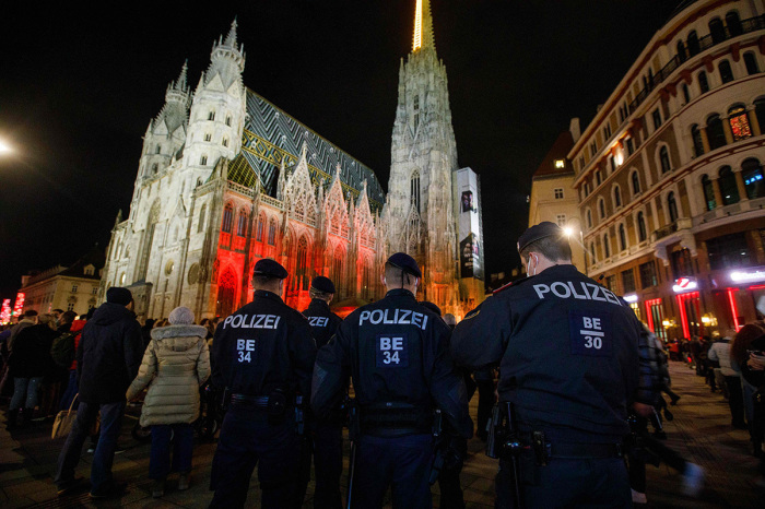Policemen are seen in front of the Stephansdom Cathedral in the city centre of Vienna, Austria.