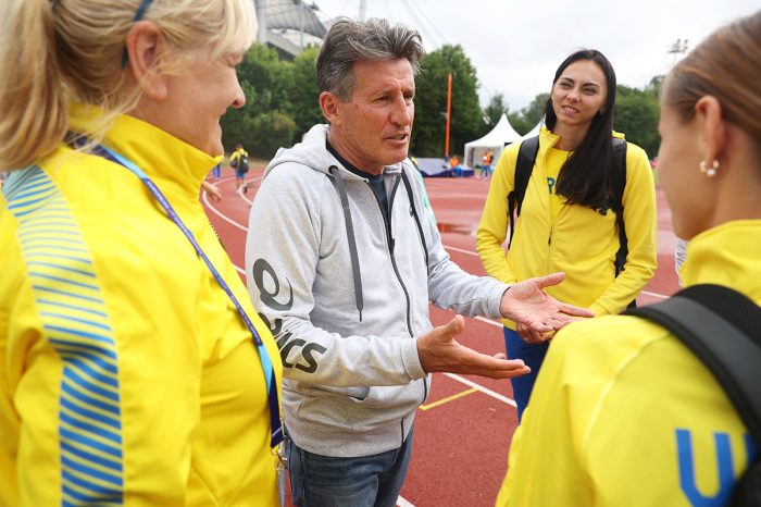 Lord Sebastian Coe, World Athletics President speaks with Athletes of Team Ukraine during the Athletics competition on day 9 of the European Championships Munich 2022 at Olympiapark on August 19, 2022, in Munich, Germany.