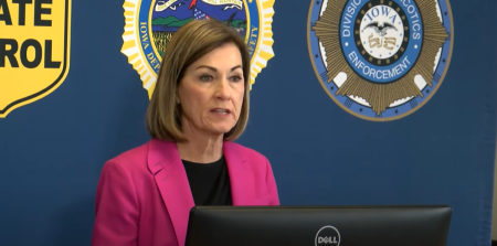 Iowa's Republican Gov. Kim Reynolds speaks about SF 538, a measure that bans gender transition procedures for minors, on March 22, 2023.