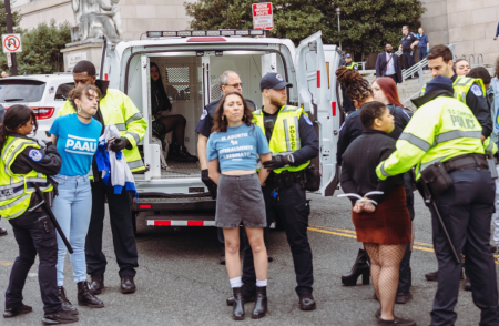Pro-life activists affiliated with the Progressive Anti-Abortion Uprising are arrested as they protest on Capitol Hill, Mar. 23, 2023. From left to right: PAAU Digital Content Creator Elise Ketch, Melanie Salazar, PAAU organizer Melanie Salazar and Constance Becker. PAAU Founder and Executive Director Terrisa Bukovinac is pictured seated in the police van.