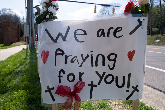 A sign showing support for the community after a mass shooting is placed near The Covenant School on March 28, 2023, in Nashville, Tennessee. Three students and three adults were killed by the 28-year-old trans-identified shooter on Monday. 