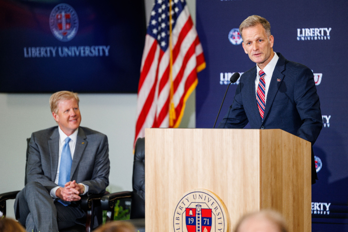 Liberty University President-designee Dondi Costin speaks during a press conference at Liberty University. Seated to his right is Chancellor-designee Jonathan Falwell.