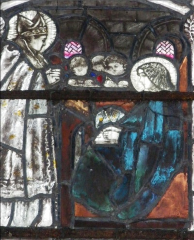 St Aidan visits St Hilda, as seen in a glass window at Gloucester Cathedral. 